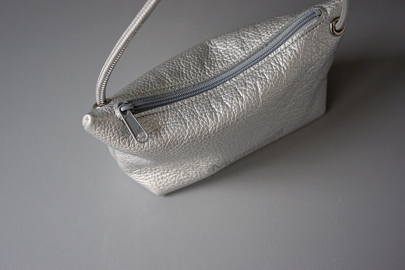 silver metallic leather pouch with cord handle