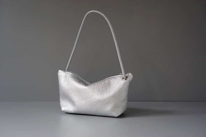 silver metallic leather pouch with cord handle