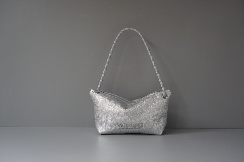 silver metallic leather pouch with cord handle