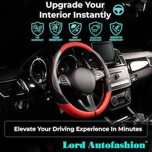 May include: A black and red steering wheel cover in a car interior. The cover is tear, dirt, weather, and scratch resistant. Text reads "Upgrade Your Interior Instantly" and "Elevate Your Driving Experience In Minutes."