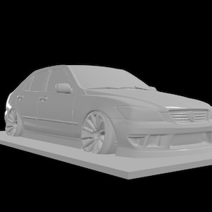 May include: A light gray sedan car model with a lowered suspension and custom wheels. The car is on a light gray rectangular base, set against a black background. The car's design includes a front spoiler and side skirts.