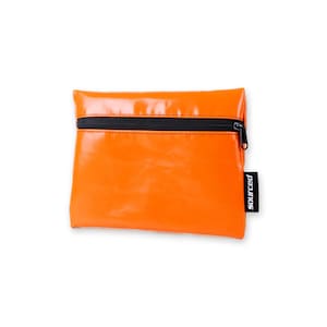 May include: Vibrant orange pouch with a black zip. The pouch has a glossy finish and a small black tag that reads "sourced". The rectangular pouch appears to be made of a durable material, suitable for various uses.