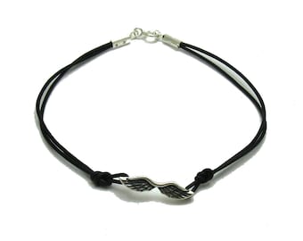 Sterling silver bracelet hallmarked 925 Angel wings with leather