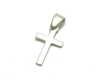 May include: A polished silver-toned metal cross pendant featuring a smooth, flat surface and a tapered bail at the top for attachment to a chain. The cross has a simple, clean design with straight edges and a reflective, metallic finish throughout.