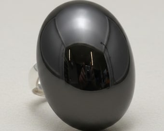 Sterlingzilveren cocktailring met 18 x 25 mm zwarte onyx gestempeld 925 verstelbare maat