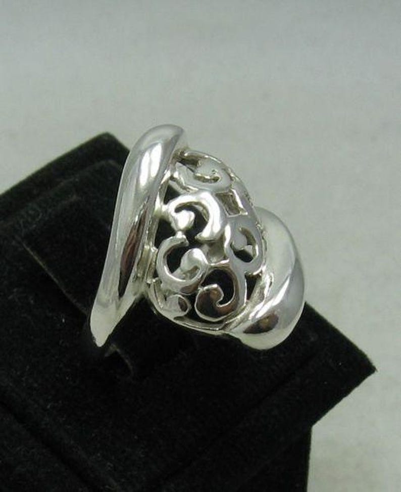 Anillo de plata de ley con diseño de volutas, joyería calada. imagen 3