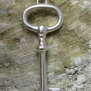 Stylish Sterling silver pendant key hallmarked 925