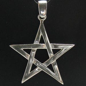 May include: A polished silver-toned metal pentagram pendant featuring a five-pointed star design with interlaced lines. The pendant includes a smooth, rounded bail at the top for attachment to a necklace, showcasing a reflective metallic finish.