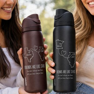 May include: Two insulated water bottles are displayed, one brown and one black. The brown bottle features a Texas outline with the name "Jasmin", and the black bottle has a Minnesota outline with the name "Emily". Both bottles have the text "FRIENDS ARE LIKE STARS".