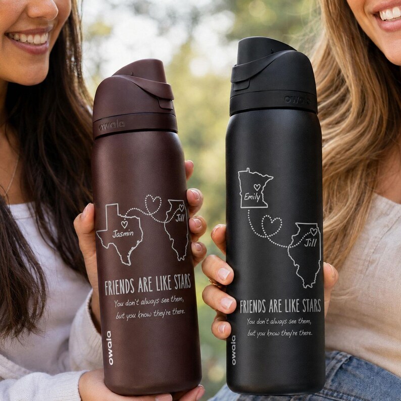 May include: Two insulated water bottles are displayed, one brown and one black. The brown bottle features a Texas outline with the name "Jasmin", and the black bottle has a Minnesota outline with the name "Emily". Both bottles have the text "FRIENDS ARE LIKE STARS".