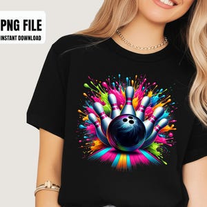 May include: Black t-shirt featuring a vibrant bowling design. The graphic includes a bowling ball and pins with colorful paint splatter effects. Text on the upper left corner reads "PNG FILE INSTANT DOWNLOAD".