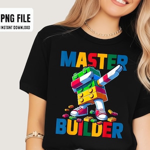 May include: Black t-shirt with the words "MASTER BUILDER" in colorful block letters. A cartoon figure made of blocks is dabbing. The shirt also has the text "PNG FILE INSTANT DOWNLOAD" in a white box.