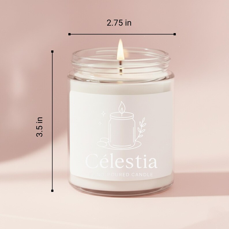May include: A lit, white candle in a clear glass jar. The jar is 2.75 inches wide and 3.5 inches tall. The label reads "C&eacute;lestia" with a candle and leaf illustration. The candle is on a light pink background.
