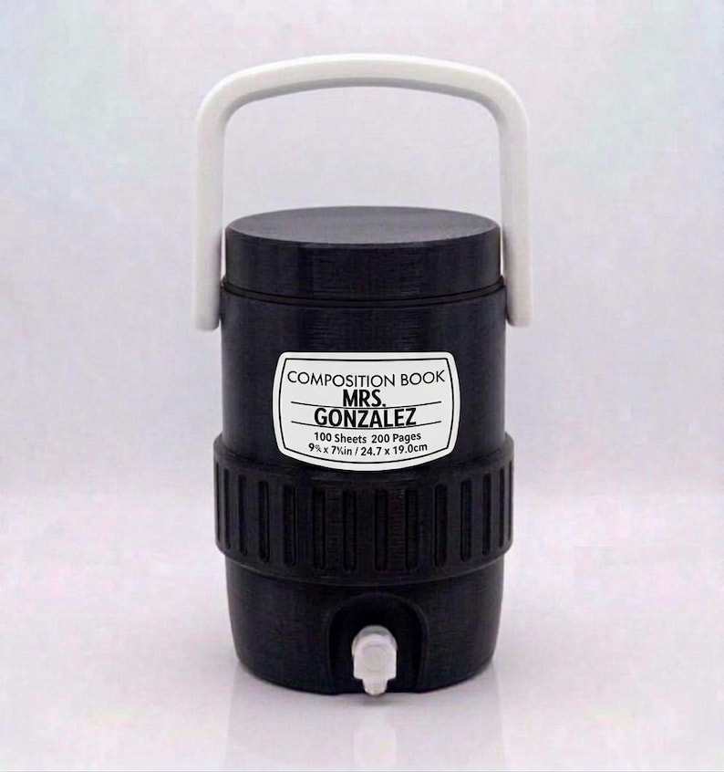 May include: A black cylindrical beverage cooler with a white handle and a white spigot at the base. A white label on the front reads COMPOSITION BOOK, MRS. GONZALEZ, 100 Sheets 200 Pages, 9 3/4 in x 7 1/2 in / 24.7 x 19.0 cm in black text.