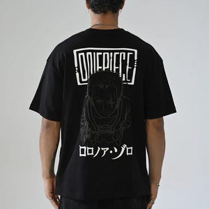 -shirt Roronoa Zoro | Produits dérivés animés One Piece | T-shirt graphique minimaliste de chasseur de pirates | Streetwear japonais | Cadeau Otaku surdimensionné pour lui et elle