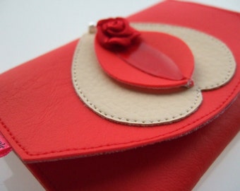 Vulvette rood en crème, yoni-zakje van imitatieleer
