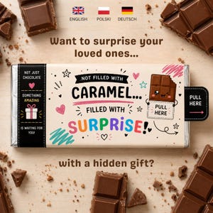 May include: A rectangular chocolate bar wrapper with a cream background, featuring the text "NOT FILLED WITH CARAMEL... FILLED WITH SURPRISE!" in colorful letters, a cartoon chocolate square, and a black pull-tab on the side labeled "PULL HERE."