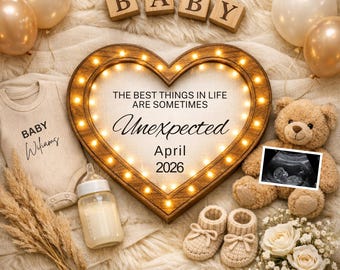 May include: A heartwarming announcement scene with a wooden heart-shaped frame lit with lights, the text "THE BEST THINGS IN LIFE ARE SOMETIMES Unexpected April 2026". Includes a baby onesie, ultrasound image, teddy bear, baby shoes, balloons, and wooden blocks spelling "BABY".