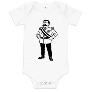 May include: White baby bodysuit featuring a black and white illustration of a cartoon character in a military uniform. The character has a large mustache and is wearing a sash and medals. The bodysuit has short sleeves and a snap closure.