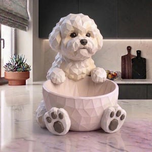 May include: A set of three ceramic mugs with a speckled, matte finish. The mugs are in shades of cream, light gray, and dark gray. Each mug has a simple, minimalist design, perfect for coffee or tea.