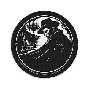 May include: A black and white embroidered patch featuring a figure in a hat and coat, set against a stylized cityscape. The design is circular, with a detailed, vintage aesthetic.