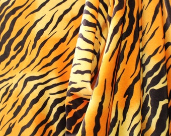 Fluwelen stof met 4-way stretch en print - tijger