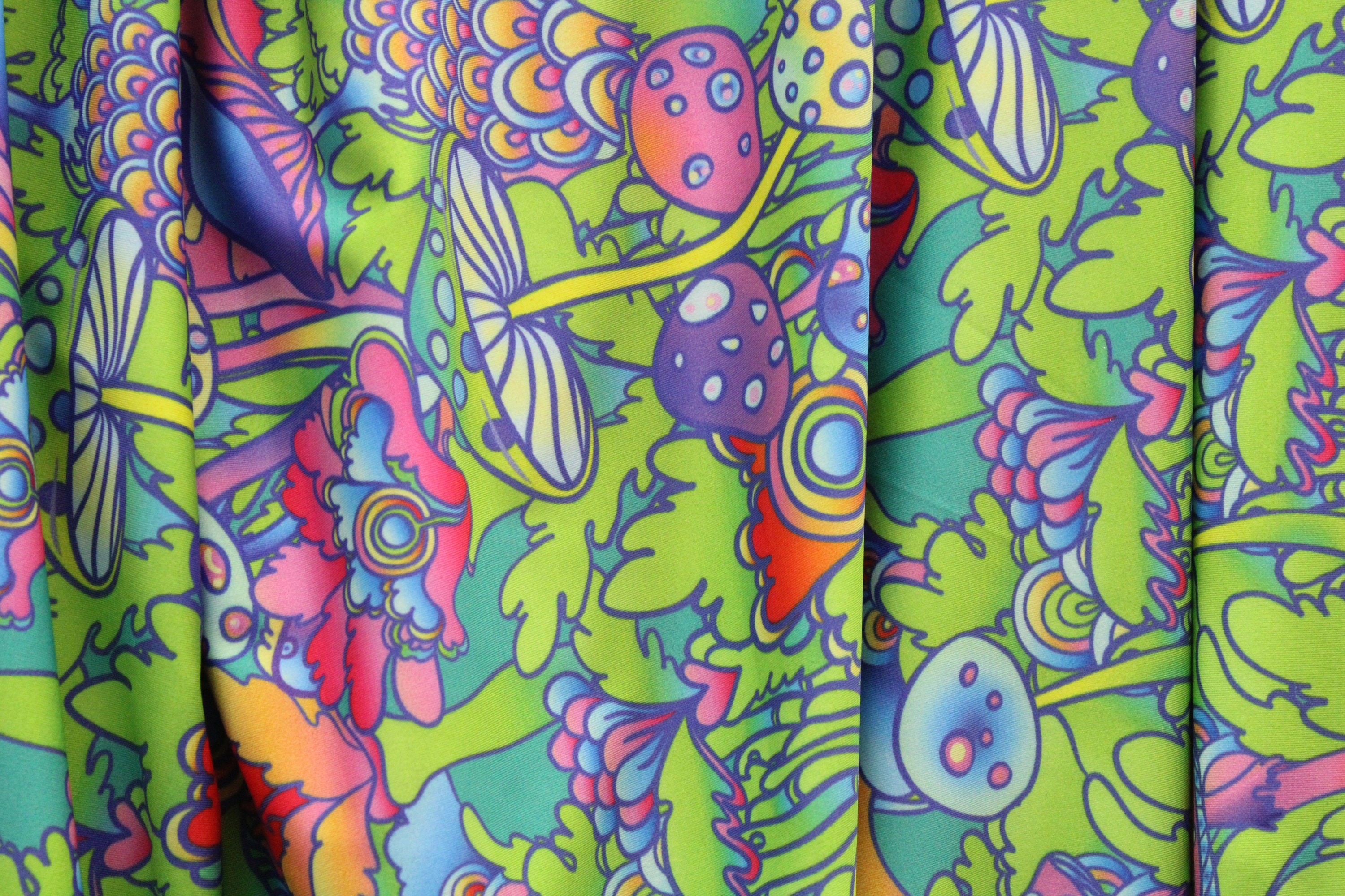 Psychedelic Oily Swirls Abstract Print Nylon Spandex Fabric by The