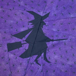 May include: A set of three ceramic mugs with a speckled, matte finish. The mugs are in shades of cream, light gray, and dark gray. Each mug has a simple, minimalist design and a rounded handle.