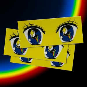 Kawaii Rainbow Anime Eyes Sticker - Yellow Background