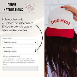 May include: A white baseball cap with a red brim and the words "DOG MOM" embroidered in red. The image also shows instructions for ordering, including selecting hat color, text placement, and adding personalization.