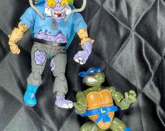 Lot De 16 Figurines Tortues Ninja (TMNT) + CheapSkate Et Sa Moto - Vintage 1989