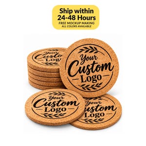 May include: A stack of round, light brown cork coasters featuring a black printed design with the text "Your Custom Logo" surrounded by a circular border and leaf accents. The coasters have a textured, granular surface appearance.