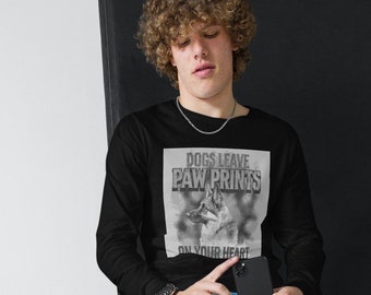 May include: A black long-sleeve shirt with a graphic print of a German Shepherd dog and the text "Dogs leave paw prints on your heart".