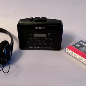 1995 SONY WM-FX211 Cassette Walkman RESTORED. Free mixtape and headphones included. Fully serviced, new belt, works perfectly.