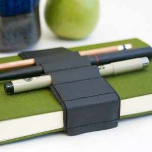Journal Bandolier // black leather // a better pencil case, journal pen holder, book strap, pen loop, pencil roll, pen bandolier image 1