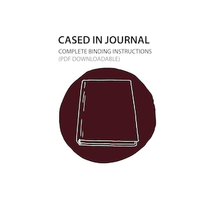 May include: A white outline of a closed book on a maroon circle with the text "CASED IN JOURNAL" and "COMPLETE BINDING INSTRUCTIONS (PDF DOWNLOADABLE)" above the circle.