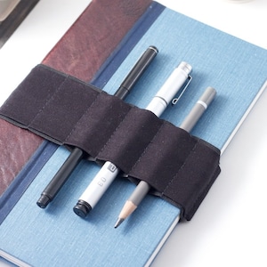 Journal Bandolier // basic black // a better pencil case, journal pen holder, book strap, pen loop, pencil roll, pen bandolier image 1