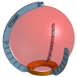 May include: A 3D rendering of a device with a light blue frame and an orange base, supporting a large, red sphere. The frame has the text "KT.Design" printed on it. The device appears to be a holder or stand.