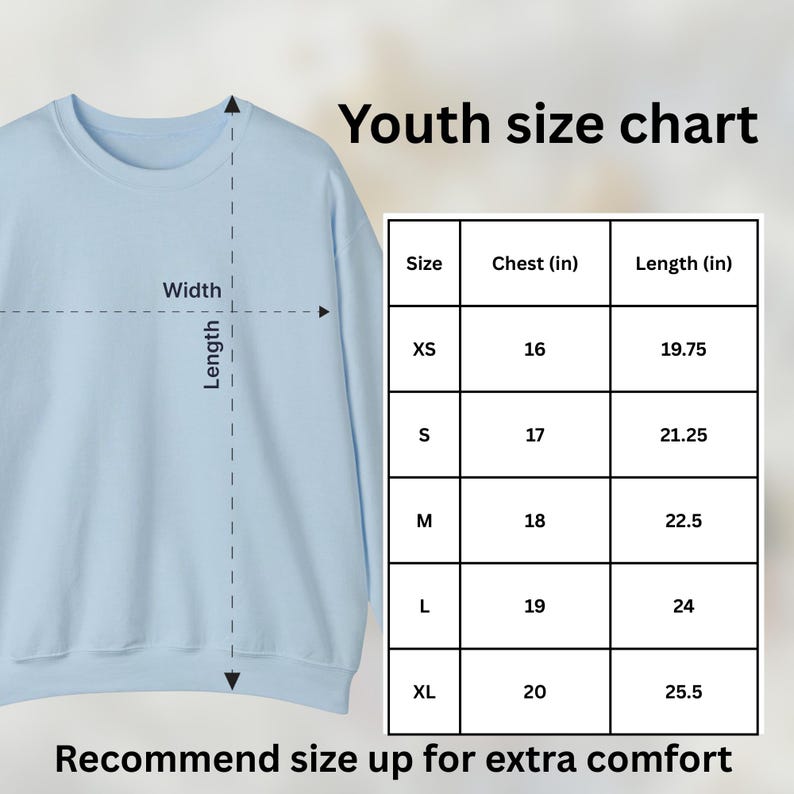 May include: A light blue youth sweatshirt with a size chart. The chart shows chest and length measurements in inches for sizes XS to XL. The text recommends sizing up for extra comfort.