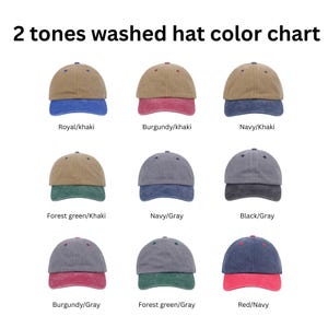 May include: A color chart of nine two-tone washed baseball caps. The caps are in various color combinations, including royal/khaki, burgundy/khaki, navy/khaki, forest green/khaki, navy/gray, black/gray, burgundy/gray, forest green/gray, and red/navy. The text "2 tones washed hat color chart" is at the top.
