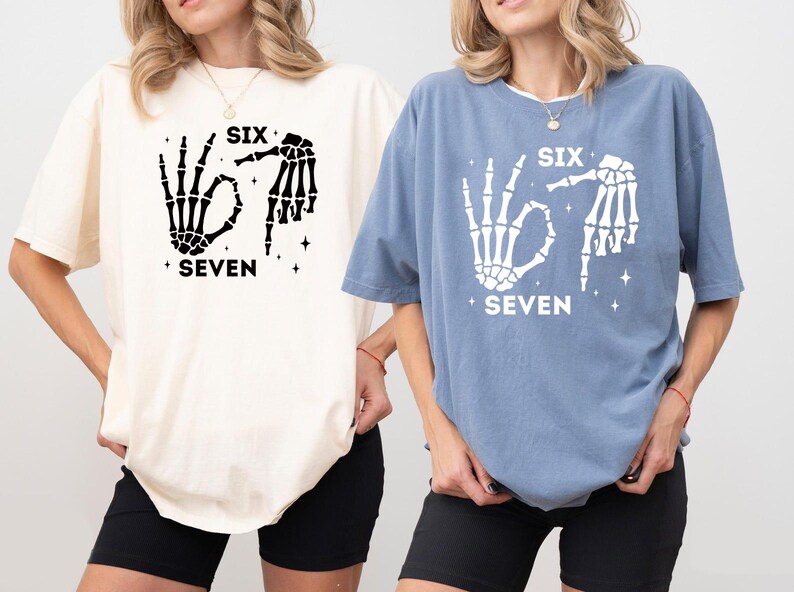 Two women wearing t-shirts with the text "SIX SEVEN" printed on them.