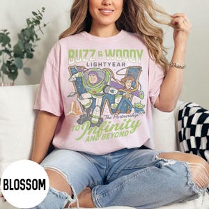 Retro Buzz And Woody Lightyear Shirt, To Infinity And Beyond Shirt, Toy Story Shirt, Disney Pixar Shirt, Disneyland Family Trip 2026 Tees Blossom/LightPink