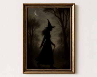 May include: Framed vintage print featuring a silhouette of a witch walking through a dark forest under a crescent moon. The witch is wearing a pointed hat and holding a staff. The print has a dark, moody aesthetic with the text "dandy vintage prints" at the bottom.