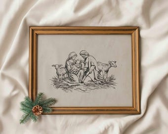 May include: A framed black and white illustration depicting the Nativity scene. The artwork shows Mary, Joseph, and baby Jesus, with two lambs. The frame is a warm, light brown color, and a sprig of pine and a pinecone are in the lower left corner.