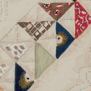 May include: Watercolor painting of a quilt pattern with triangular patches. The patches feature various designs, including geometric patterns, floral motifs, and abstract shapes. Colors include brown, red, blue, and green, set against a cream background.
