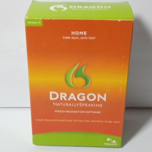 May include: A rectangular software box for Dragon NaturallySpeaking Home Version 11. The box is orange with lime green accents at the top and bottom. It features the Dragon logo, the text "Turn Talk...Into Text," and the Nuance brand logo.
