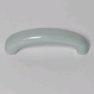 May include: A smooth, arched cabinet handle with a glossy, light gray finish. The hardware features a simple, curved design with rounded ends, providing a clean and uniform appearance suitable for attachment to drawers or cabinet doors.
