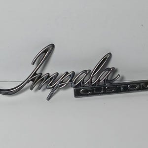 1970  Impala Custom Sail Panel Emblem GM 9840507