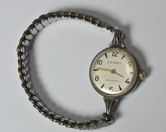 Relógio analógico vintage feminino Dorset, de corda manual, fabricado na Alemanha, não testado.