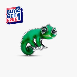 May include: A green chameleon charm with black eyes and silver accents. The charm is in a sitting position and has a glossy finish. The image also includes a "BUY 2 GET 1 FREE" offer.